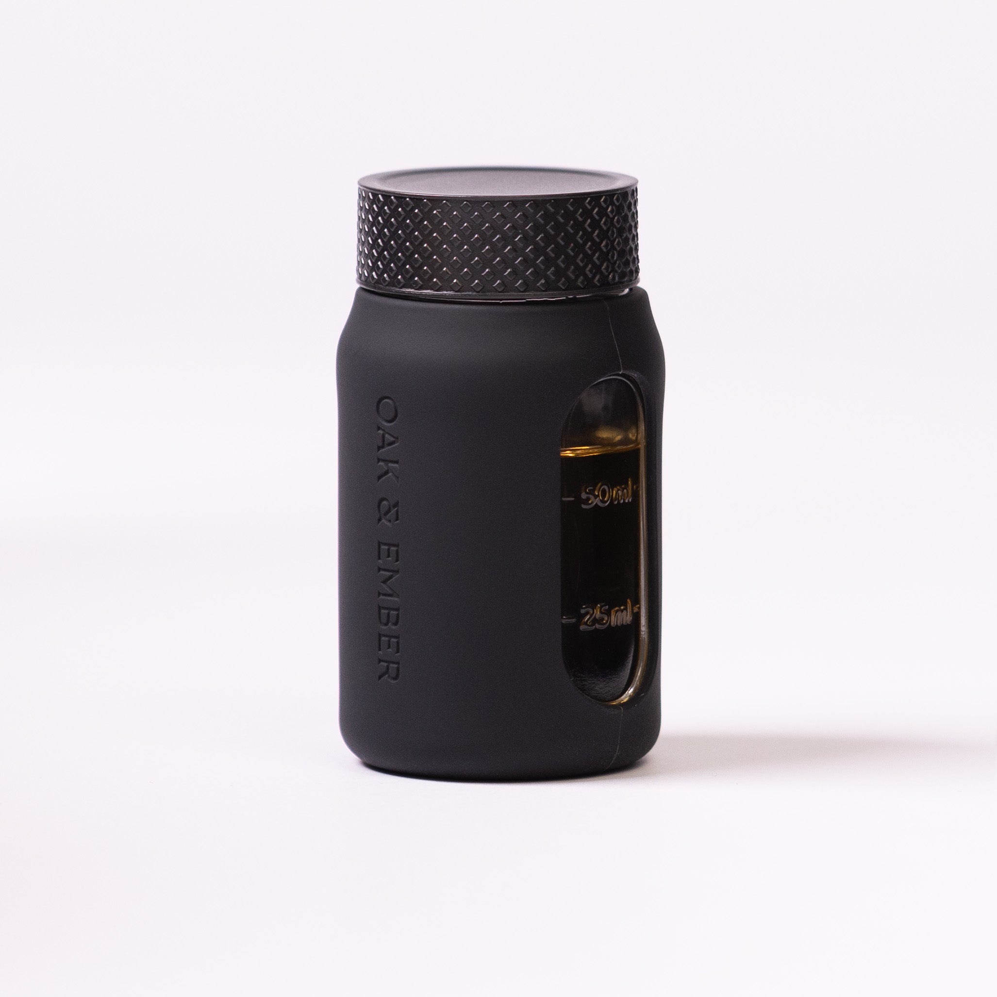 Flight Flask premium glass spirits flask with measurement window and protective silicone sleeve
