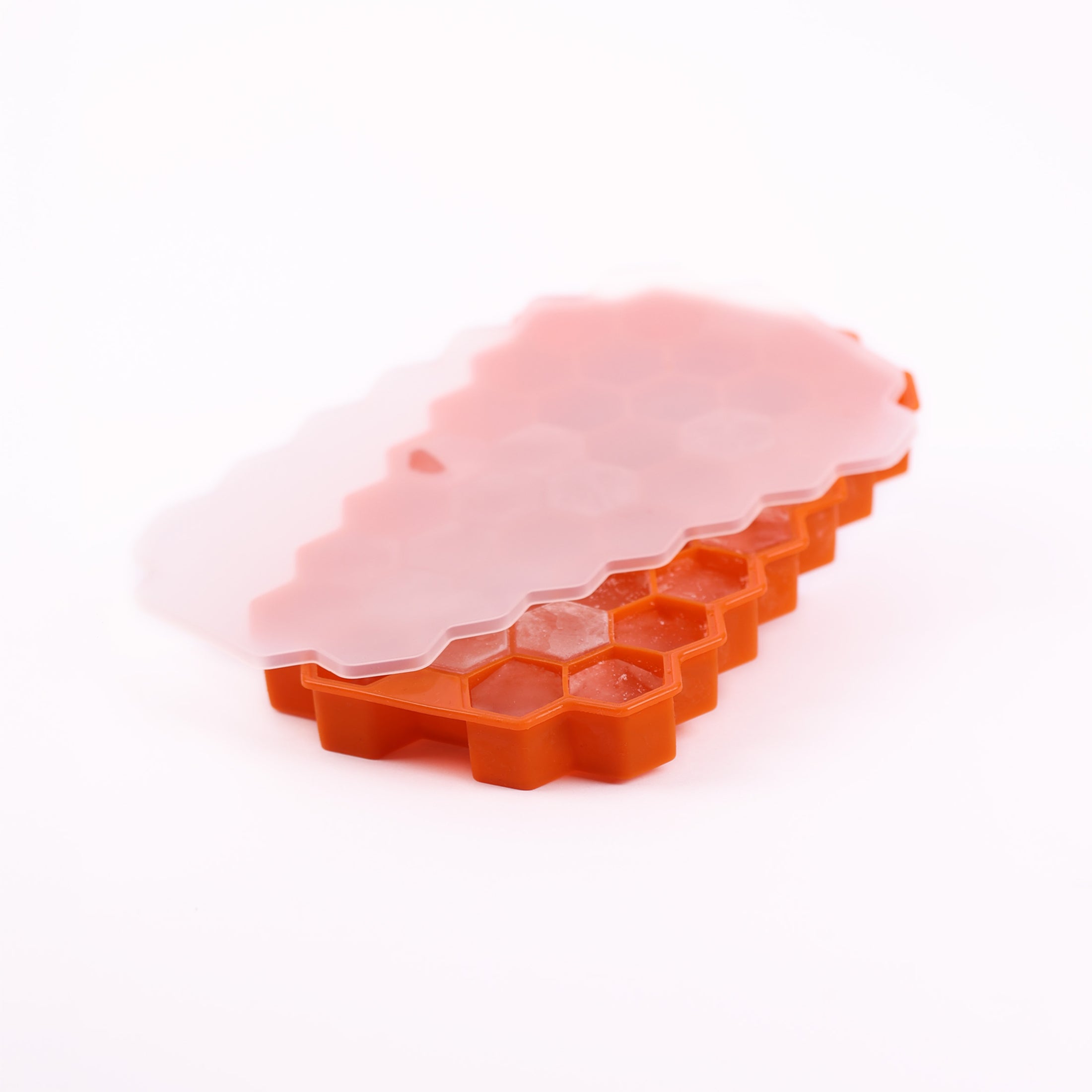 37 hexagon ice cube mould tray in black and orange for cocktails, spirits and chilled drinks