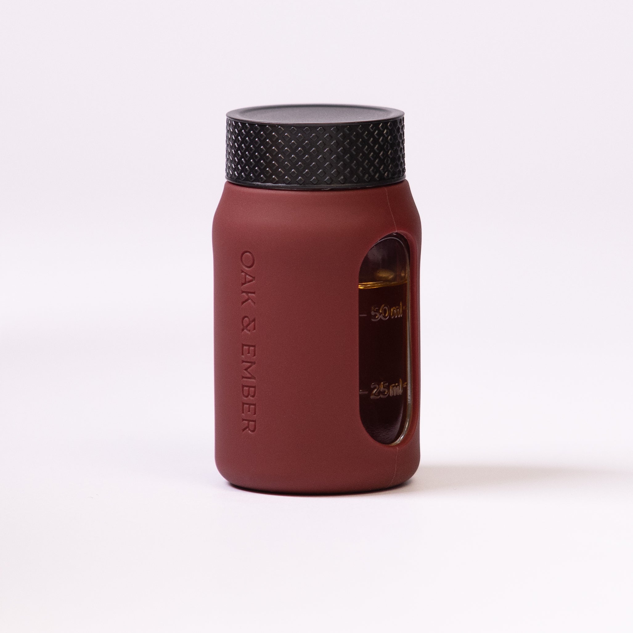 Flight Flask premium glass spirits flask with measurement window and protective silicone sleeve