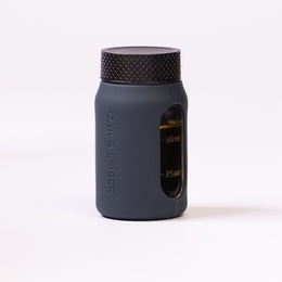 Flight Flask premium glass spirits flask with measurement window and protective silicone sleeve