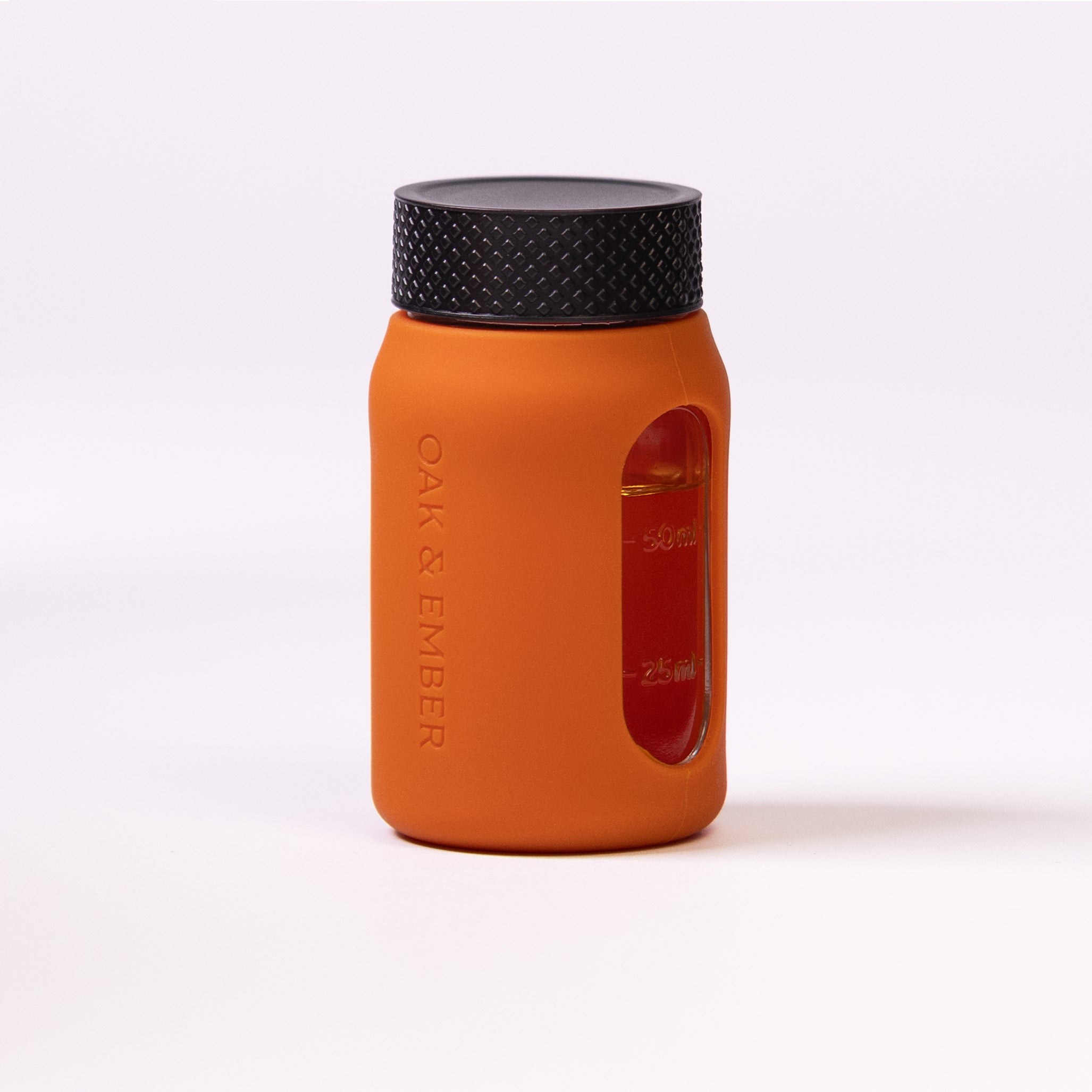 Flight Flask premium glass spirits flask with measurement window and protective silicone sleeve