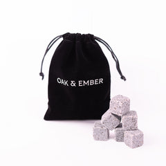 Whisky stones gift set with six granite chilling stones and black velvet storage pouch